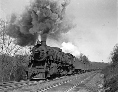 New York Ontario and Western 4-8-2 steam locomotive 408 leading westbound passenger train no. 9 at Firthcliffe, New York, on March 2, 1946. Photograph by Donald W. Furler, Furler-03-083-01, © 2017, Center for Railroad Photography and Art