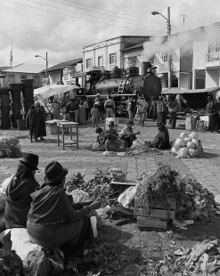 Guayaquil and Quito Railway steam locomotive no. 53 in market in Guamote, Chimborazo, Ecuador, on August 21, 2003. Photograph by William Botkin. © 2003, William Botkin