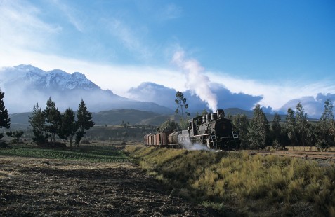 Guayaquil & Quito steam locomotive no. 53 leads  southbound mixed train south of Tambo Siberia, Azyay, Ecuador, on August 22, 2003. Photograph by Katherine Botkin. BOTKINK-102-KT-39, © 1983, Katherine Botkin