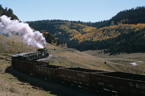 Denver and Rio Grande Western Railroad steam locomotive no. 489 hauls eastbound coal empties between Los Pinos and Osier, Colorado, on October 5, 2016. BOTKINK-08-KT-465, Photograph by Katherine Botkin. © 2005, Katherine Botkin.