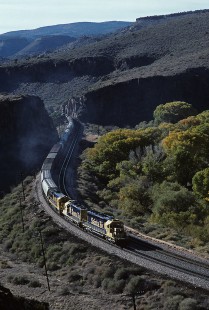 Atchison, Topeka, and Sante Fe Railroad diesel locomotive no. 5071 leads freight train through Crozier Canyon in Arizona on November 4, 1994. BOTKINK-15-KT-38, Photograph by Katherine Botkin. © 1994, Katherine Botkin