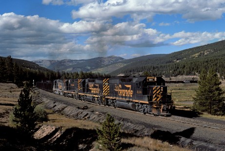 Denver and Rio Grande Western Railroad diesel locomotive no. 3114 hauls coal over the Tennessee Pass in Colorado in September of  1977. Photograph by William Botkin. © 1977, William Botkin