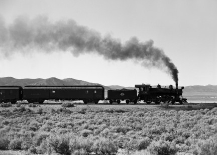 Nevada Northern Railway steam locomotive no. 40 leads passenger train between Hiline and Adverse, Nevada, on October 30, 1993. Photograph by William Botkin. © 1993, William Botkin