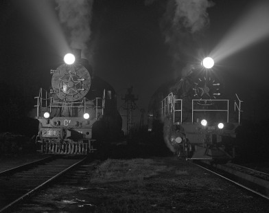Укрзалізниця (Ukrainian Railways) steam locomotive nos. 251-86 and 218-31 in Rakhiv, Transcapathia, Ukraine, on October 6, 1996. Photograph by William Botkin. © 1996, William Botkin