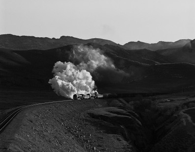 Eastbound Jitong Railway QJ-class steam locomotive nos. 7164 and 6986 west of Sandi, a station in Inner Mongolia, China, on December 4, 2004. Photograph by William Botkin. © 2004, William Botkin