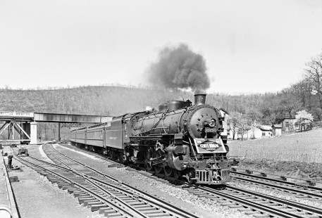 Lehigh Valley Railroad 4-6-2 K-6B steam locomotive 2092 leading the first section of train 9, the "Black Diamond," west at Treichler, a railroad location in North Whitehall Township, Pennsylvania, on April 20, 1946. Note the banner on the front of the locomotive for the railroad's centennial. Photograph by Donald W. Furler, Furler-12-016-01, © 2017, Center for Railroad Photography and Art