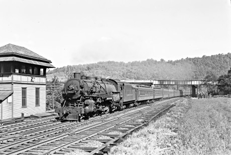 Lehigh Valley Railroad 4-6-2 K-3 steam locomotive 2032 leading train 25, the "Asa Packer," at Treichler, a railroad location in North White Hall Township, Pennsylvania, on September 15, 1946. Photograph by Donald W. Furler, Furler-12-011-02, © 2017, Center for Railroad Photography and Art 

Treichler, located at milepost 104.2, was once listed in the railroad's timetable as "Cherry Ford," and you can just make out "CF" on the end of the tower's nameplate. The mechanical interlocking was installed in 1927 to control train movements between the four-track section east of Treichler and the two-track section to the west.