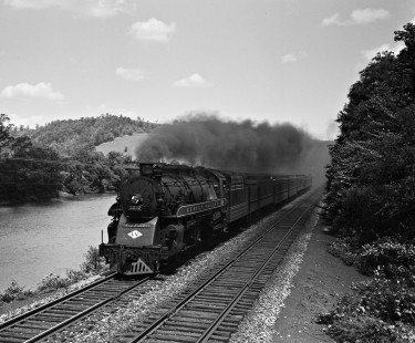 Lehigh Valley Railroad K-3 4-6-2 steam locomotive 2022 with passenger train no. 25, the "Asa Packer," running west along the Lehigh River south of Slatington, Pennsylvania, in July 1940. The train's namesake was the father of the railroad and founder of Lehigh University in Bethlehem, Pennsylvania. Photograph by Donald W. Furler, Furler-03-088-02, © 2017, Center for Railroad Photography and Art