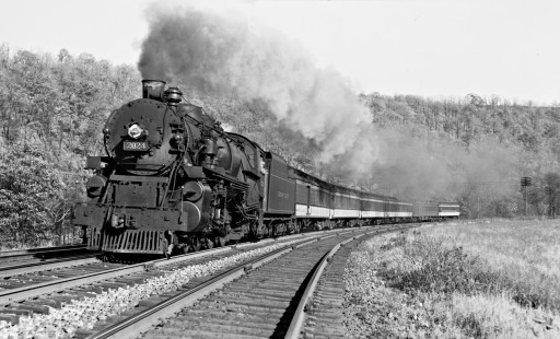 Lehigh Valley Railroad K-3 4-6-2 steam locomotive 2024 with passenger train 25, the "Asa Packer," heading west at the railroad location of Treichler on the west bank of the Lehigh River in North Whitehall Township, Pennsylvania on November 11, 1939. Photograph by Donald W. Furler, Furler-08-008-01, © 2017, Center for Railroad Photography and Art