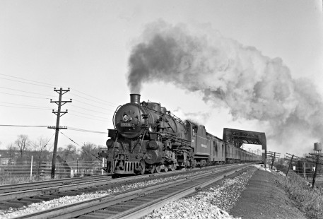 Lehigh Valley Railroad 4-6-2 K-6B steam locomotive 2091 leading train 9, the "Black Diamond," at Aldene, New Jersey, on November 28, 1946. The bridge in the background crosses the Central Railroad of New Jersey. Photograph by Donald W. Furler, Furler-12-015-01, © 2017, Center for Railroad Photography and Art