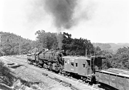 Baltimore and Ohio Railroad steam locomotive no. 6103 pushing a freight train at Manila, a railroad location in Meyersdale, Pennsylvania, circa 1952. Photograph by Donald W. Furler, Furler-16-061-02, © 2017, Center for Railroad Photography and Art