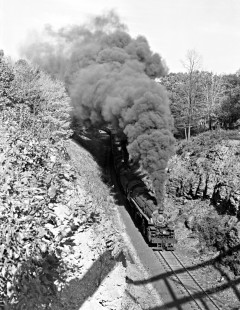 Baltimore and Ohio Railroad 2-8-8-0 steam locomotive nos. 7155 and 7170 leading a 30-car empty coal train west in an overhead view at Locust, Pennsylvania, on October 25, 1954. Photograph by Donald W. Furler, Furler-14-013-01, © 2017, Center for Railroad Photography and Art