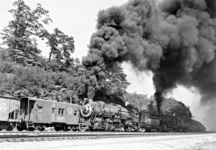 Baltimore and Ohio Railroad 2-10-2 steam locomotive nos. 6205 and 6102 pushing a 71-car freight train west with engines 6208 and 7112 on the head end at the Manila railroad location in Meyersdale, Pennsylvania, on September 6, 1952. Photograph by Donald W. Furler, Furler-14-006-02, © 2017, Center for Railroad Photography and Art