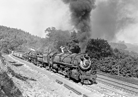 Baltimore and Ohio Railroad 2-10-2 steam locomotive nos. 6195 and 6188 leading a 95-car ore train west, with engines nos. 6161 and 6127 pushing, at Manila, a railroad location in Meyersdale, Pennsylvania, on September 6, 1952. Photograph by Donald W. Furler, Furler-14-004-01, © 2017, Center for Railroad Photography and Art
