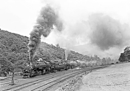 Baltimore and Ohio Railroad 2-8-8-0 steam locomotive no. 7144 and 2-8-8-4 steam locomotive no. 7625 with a 63-car freight train west at Swanton, Maryland, on September 4, 1949. Photograph by Donald W. Furler, Furler-14-010-02, © 2017, Center for Railroad Photography and Art