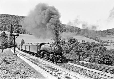 Baltimore and Ohio Railroad 4-6-2 steam locomotive no. 5061 with seven-car passenger train no. 21 at Mance, Pennsylvania, on August 21, 1952. Photograph by Donald W. Furler, Furler-13-001-01, © 2017, Center for Railroad Photography and Art