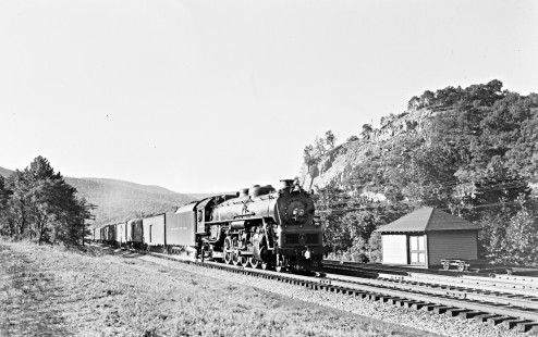 Baltimore and Ohio Railroad 4-8-2 steam locomotive no. 5566 with 14-car train no. 32 at Mt. Savage Junction in Corriganville, Maryland, on August 24, 1952. Photograph by Donald W. Furler, Furler-16-057-02, © 2017, Center for Railroad Photography and Art