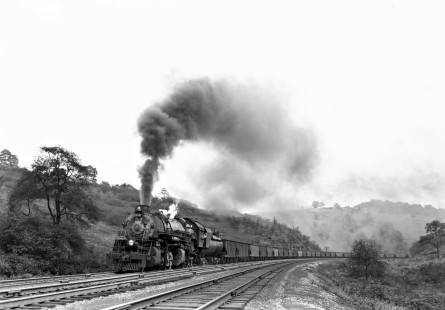 Baltimore and Ohio Railroad 2-8-8-0 steam locomotive no. 7117 leading a 50-car freight train west at Swanton, Maryland, on September 5, 1948. Photograph by Donald W. Furler, Furler-14-008-02, © 2017, Center for Railroad Photography and Art