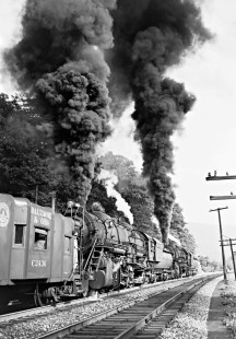 Baltimore and Ohio Railroad 2-10-2 steam locomotives no. 6135 and no. 6140 push a freight train west at Hyndman, Pennsylvania, on August 6, 1953. Photograph by Donald W. Furler, Furler-13-120-01, © 2017, Center for Railroad Photography and Art