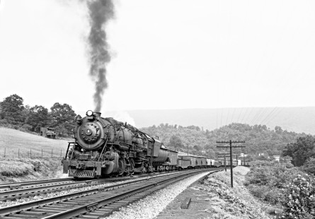 Baltimore and Ohio Railroad 2-10-2 steam locomotive no. 6119 leading a freight train of 55 cars west with steam locomotive nos. 6135 and 6145 pushing at Hyndman, Pennsylvania, on August 6, 1953. Photograph by Donald W. Furler, Furler-13-112-01, © 2017, Center for Railroad Photography and Art