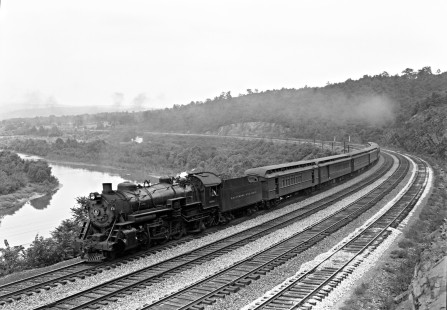 Baltimore and Ohio Railroad 4-6-2 steam locomotive no. 5006 leading seven-car passenger train no. 21 west along the Potomac River at Orleans Road in Great Cacapon, West Virginia, on September 3, 1949.  Photographed by Donald W. Furler, Furler-13-081-01, © 2017, Center for Railroad Photography and Art