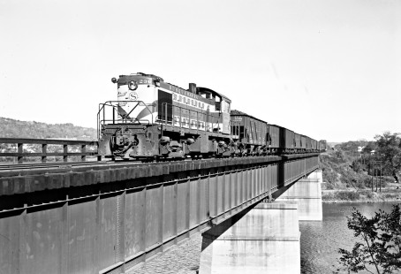 New York, Susquehanna and Western Railway diesel locomotive no. 236 leading an eastbound freight with 13 cars across the Passaic River at Paterson, New Jersey, on October 19, 1946. Photograph by Donald W. Furler, Furler-13-033-02, © 2017, Center for Railroad Photography and Art