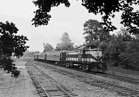 New York, Susquehanna and Western Railway diesel locomotive no. 231 leads a passenger train at Wortendyke, New Jersey on August 23, 1942. One car continued to Stillwater and carried this schedule for a few Sundays during the summer of 1942. Photograph by Donald W. Furler, Furler-13-032-02, © 2017, Center for Railroad Photography and Art