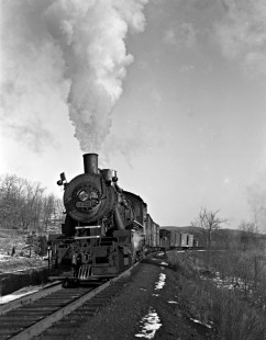 New York, Susquehanna and Western Railway 2-10-0 J-2 steam locomotive no. 2484 with a westbound freight train pulling out from switch after picking up cars from Greenwood Lake at Pompton Lakes, New Jersey on March 12, 1940. Photograph by Donald W. Furler, Furler-03-099-01, © 2017, Center for Railroad Photography and Art