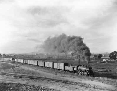 National Railways of Mexico steam locomotive no. 210 
leads northbound mixed train at Puebla, Puebla, Mexico, on December 25, 1962. Photograph by Victor Hand, Hand-NdeM-01-619.JPG