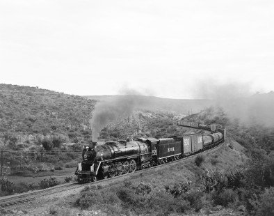 National Railways of Mexico steam locomotive no. 3036 pulling southbound freight at Hercules Canyon, Querétaro, Mexico, on June 24, 1964. Photograph by Victor Hand, Hand-NdeM-04-229.JPG