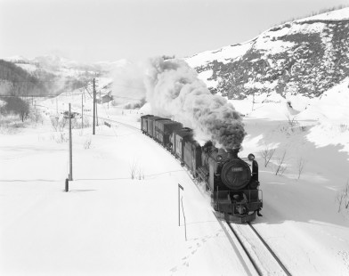 Japanese National Railways steam locomotive no. 19640 pulling southbound freight train #6972 on Iwanai Branch at Kunitomi, Shiribeshi, Japan, on January 20, 1971. Photograph by Victor Hand, Hand-JNR-18-079.JPG