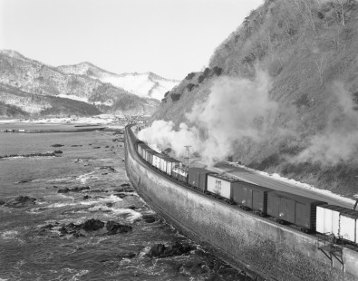 Japanese National Railways steam locomotive no. D52-414 hauling southbound freight train #1354 on Muroran main line at Rebun, Hokkaido, Japan, on January 19, 1971. Photographs by Victor Hand, Hand-JNR-18-062.JPG
