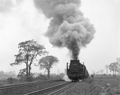 Japanese National Railways steam locomotive no. D52-404 pulling southbound freight on Hakodate main line at Onama, Hokkaido, Japan, on June 6, 1966. Photograph by Victor Hand, Hand-JNR-10-004.JPG