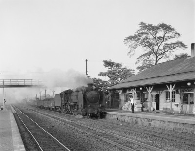 Japanese National Railways steam locomotive no. D51-1097 pulling southbound freight train at Shiraoi, Hokkaido, Japan, on June 12, 1966. Photograph by Victor Hand, Hand-JNR-10-083.JPG
