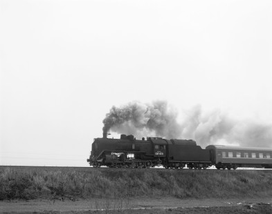 Soviet Railways steam locomotive SO 17-4371 pulling a southbound passenger excursion train running from Gretchany to Larga at Negin, Ukraine, on December 9, 1992. Photograph by Victor Hand, Hand-SZD-254-275