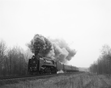 Soviet Railways steam locomotive P36-050 pulling a passenger excursion train south from Korosten to Shepetovka at Granitny, Ukraine, on December 7, 1992. Photograph by Victor Hand, Hand-SZD-254-253