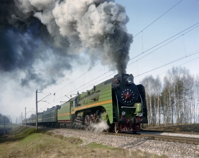 Soviet Railways steam locomotive P36-071 pulling a passenger excursion train east from Minsk to Orsha at Privatnino, Republic of Belarus, on April 17, 1992. Photograph by Victor Hand, Hand-SZD-C254-07