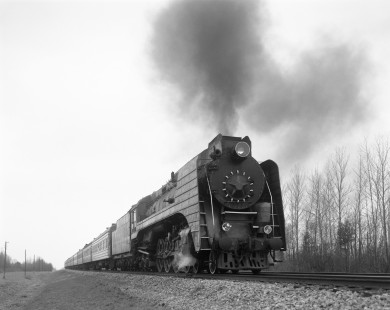 Soviet Railways steam locomotive P36-071 pulling a passenger excursion train east from Lida via Molodeohno to Minsk at Bogdanov, Republic of Belarus, on April 16, 1992. Photograph by Victor Hand, Hand-SZD-254-115