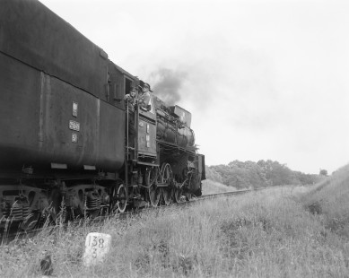 Polish State Railways steam locomotive OL49-85 pulling an excursion west running from Torun to Warszawa at Ograszka, Republic of Poland, June 3, 1990. Photograph by Victor Hand, Hand-PKP-SZD-VR-251-090