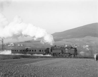 Polish State Railways steam locomotive 0KT32-2 hauling an eastbound passenger excursion train from Chabowka to Nowy Sacz at Kasina Wielka, Limanowa, Republic of Poland, on April 14, 1992. Photograph by Victor Hand, Hand-PKP-254-60