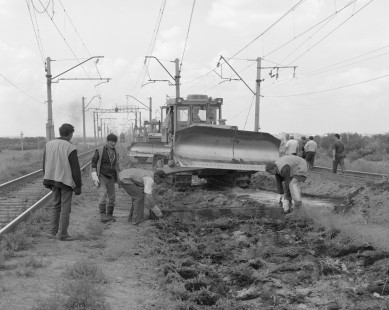Soviet Railways tie and work gang use machinery for track replacement at Sorocobaya, Republic of Kazakhstan, on July 28, 1995. Photograph by Victor Hand, Hand-SZD-265-28