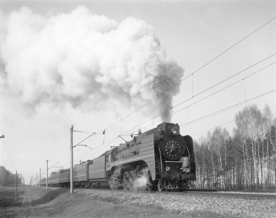 Soviet Railways steam locomotive P36-071 leading an eastbound passenger excursion train from Minsk to Orsha at Privatnino, Republic of Belarus, on April 17, 1992. Photograph by Victor Hand, Hand-SZD-254-128