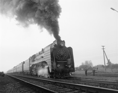 Soviet Railways steam locomotive P36-071 hauling a passenger excursion train north from Baranovichi to Lida at Dvorets, Grodno, Republic of Belarus, on April 16, 1992. Photograph by Victor Hand, Hand-SZD-254-108
