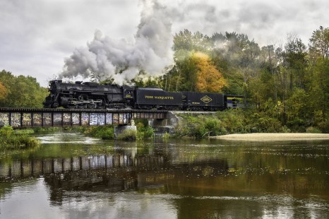 Steam excursion of the Pere Marquette 1225, for the 50th anniversary of the Michigan State University Railroad club. The MSU RR club was the group that in 1969, started the effort to restore the PM1225, and some of the original members were riding on this excursion. This was taken on October 5, 2019, as the PM1225 crossed the Muskegon River, on her way between Mount Pleasant and Cadillac, Michigan. © Scott Shields