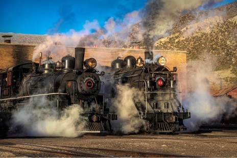 Locomotives 40 and 93 exit the engine house at Nevada Northern Railway's Ely Yard together in a staged shoot for one of the NNRY’s Winter Photography Workshops, on February 8, 2020. © Roger Van Alyne