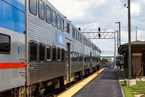 An afternoon inbound Metra train boards its first passengers at Elburn station, on August 21, 2015. © Sean Lamb
