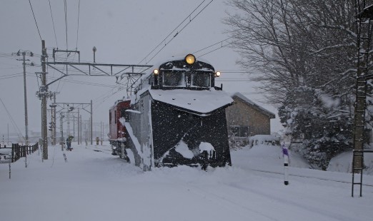 Konan Tetsudo, Japan's 42-inch gauge "Apple Country Interurban" in Aomori Prefecture operates two rural single track lines, each of which has an unusual winter snow plow operation. Here on February 6, 2020 is westbound "Russel Plow" #104 at Inakadate, pushed by locomotive ED-333, a 1923 Baldwin-Westinghouse electric motor. © John Kirchner