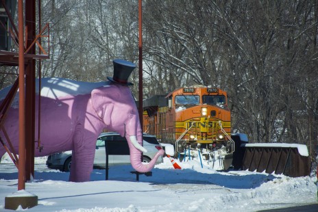 BNSF 7670 is greeted by Roadside America's Pinky the Elephant in Marquette, Iowa, on February 13, 2019. © Bob Gallegos