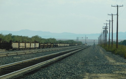 Intermodal flatcars at Kelso Depot in Kelso, California, on July 26, 2019. © Reese Davies
