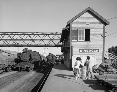 Onlookers watch Victorian Railways steam locomotive no. J553 pull into Dimboola Station with an extra passenger train coming from Horsham, Australia, on April 11, 1967. Photograph by Victor Hand, Hand-NSW-QR-SAR-VR-12-089